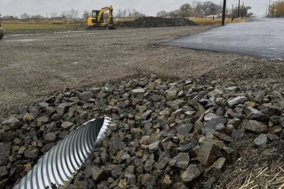 Culvert end with spall armor protection